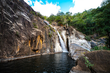 panorama of jourama falls in paluma range national park, north queensland, australia; cascade of...