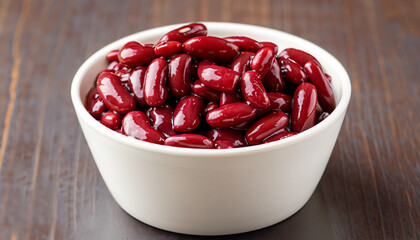 Canned red kidney beans in white bowl on a table