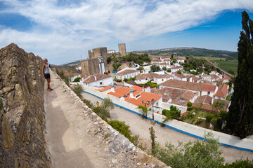 Obidos, Portugal - Visiting the beautiful fortified Portuguese village of Obidos during summer