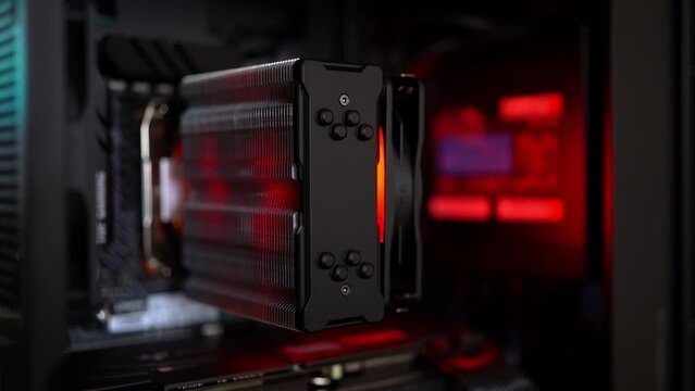 Dnieper. Ukraine 11.05.2023: Computer fan. DDR4. Modern case cooling system. Installation of HTPC, Hackintosh PC and Gaming PC with liquid cooling system and full ARGB lighting inside