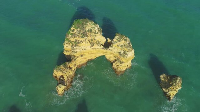 Aerial view of sea-stacks at the rocky Algarve coast, Portugal