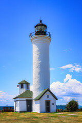 An old lighthouse and keeper's home in Cape Vincent NY.  Lighthouse along the shores of Lake...