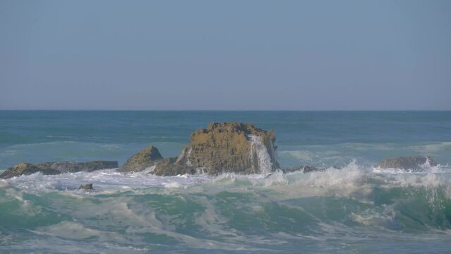 Waves crashing on rocks at the Atlantic west coast of Portugal