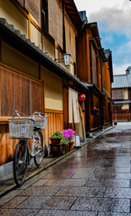 Japanese traditional wooden townhouses in Kyoto, street or side alley view in historical capital of Japan, vernacular architecture, Machiya