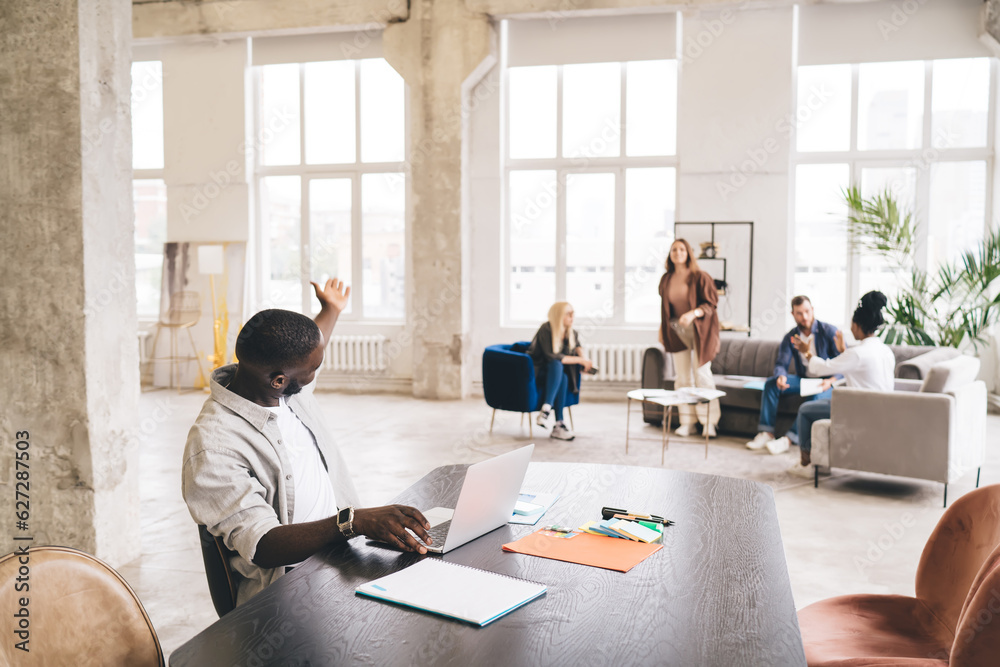 Poster group of diverse people working in spacious office