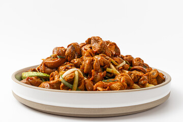 Whelk and vegetable seasoning on a white background