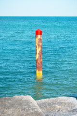 Marker post at the port