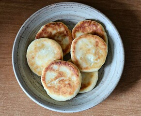 close-up of delicious pastries. Cheesecakes, pancakes