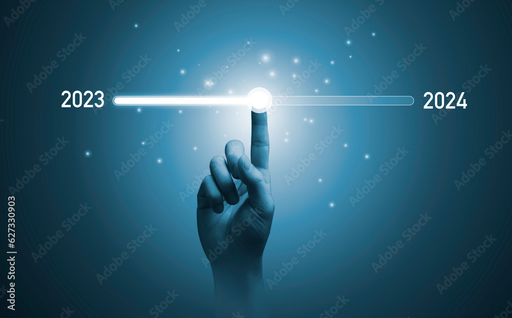 Wall mural hand touching on download bar status to change from 2023 to 2024 for countdown of merry christmas an