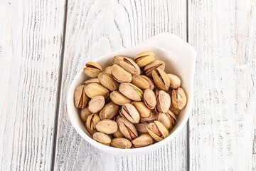 Salted tasty pistachio nuts heap