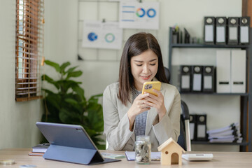 Asian female home sales representatives consulting customers online with smartphones and tablets.