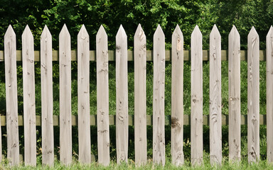 A wooden fence with trees in background. AI generative 