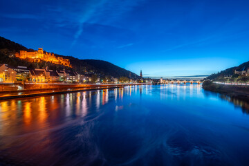Heidelberg castle at night along the Neckar River, Germany