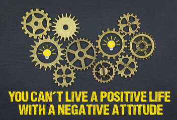 you can't live a positive life with a negative attitude	