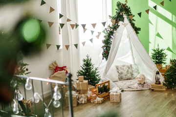 Christmas interior of a children's room with teepee