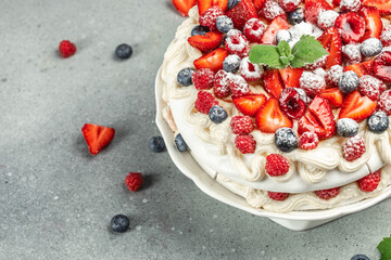Pavlova cake with whipped mascarpone cream and fresh strawberry, Restaurant menu, dieting, cookbook recipe top view