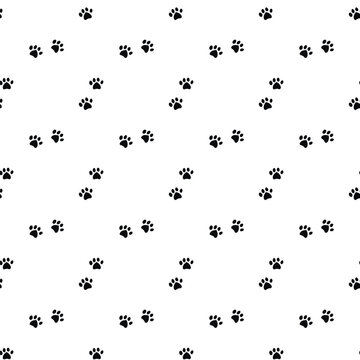 seamless pattern with traces of dog paws
