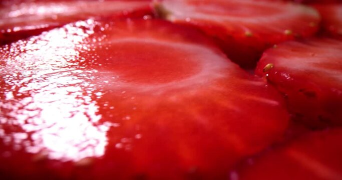Half slice of fresh juicy strawberries closeup. Delicious sweet berry