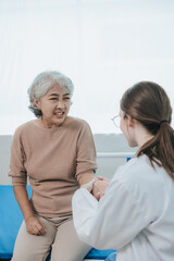 Portrait of beautiful doctor sharing data from digital tablet with elderly patient