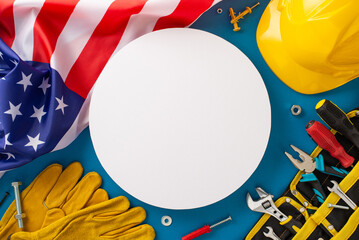 Engage your audience with this construction-themed Labor Day celebration top-down shot, featuring a flag, work helmet, gloves, and toolkit on blue backdrop. Ideal for Labor Day promotions or ads - Powered by Adobe