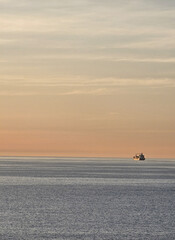 fishing boat at sunset