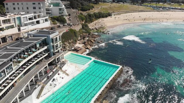 Aerial panoramic view of Bondi Beach pools and coastline on a beautiful winter day, Australia
