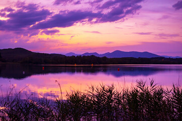Beautiful lake in the mountains at sunset. Lake of Banyoles - Girona - Spain