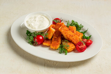 fried fish nuggets, with white sauce, arugula and cherry, no people,