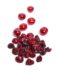 Dried cherry heap with ripe cherry. Isolated on white background