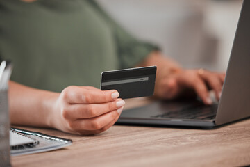 Hand, laptop and credit card for finance with a customer on the internet from home. Computer, ecommerce and payment with a person using a bank app for online shopping, accounting or budget planning