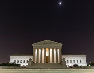 U.S. Supreme Cout Building at night under the crescent moon, Washington D.C