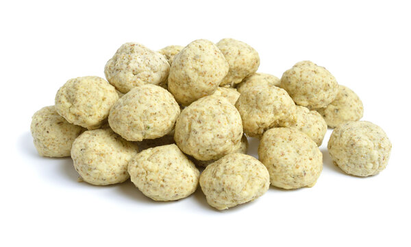 Kashk, qurut, gurt, chortan, or aaruul and khuruud. With herbs isolated on white background
