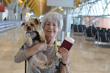 Senior woman traveling with her dog 