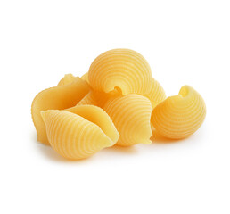 Heap of uncooked shell pasta close up isolated on white background