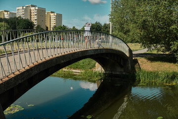 Obraz premium Bow bridge in Central park at spring sunny day