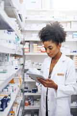 I have the right tools to keep my pharmacy under control. Cropped shot of a pharmacist using a...