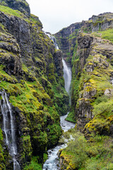 Beautiful mossy canyon at Glymur Waterfall in Iceland