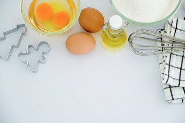 Fresh baking ingredients on kitchen table.