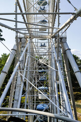 Photograph of ferris wheel carousel from below