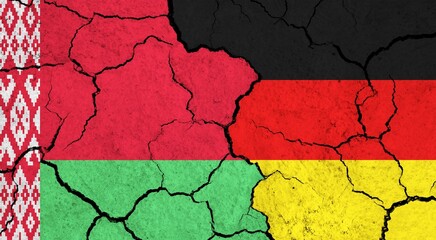 Flags of Belarus and Germany on cracked surface - politics, relationship concept