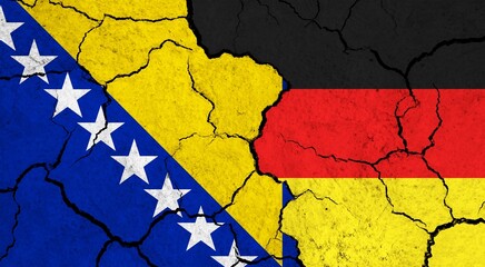 Flags of Bosnia and Germany on cracked surface - politics, relationship concept