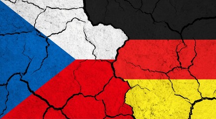 Flags of Czech Republic and Germany on cracked surface - politics, relationship concept