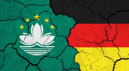 Flags of Macau and Germany on cracked surface - politics, relationship concept