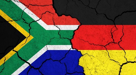 Flags of South Africa and Germany on cracked surface - politics, relationship concept