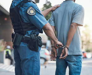 Stop, handcuffs and hands of police man with criminal in city for justice, crime or corruption. Illegal, arrest and law enforcement officer with suspect, thief or gangster for jail, robbery or fail - obrazy, fototapety, plakaty