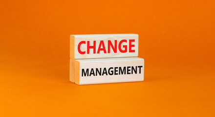 Change management symbol. Concept words Change management on beautiful wooden block. Beautiful orange table orange background. Business change management concept. Copy space.
