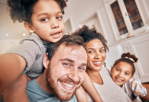 Selfie, smile and piggyback with a blended family in their home together for love, fun or bonding closeup. Portrait, happy or support with parents and kids posing for a playful photograph in a house