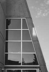 Modern architecture minimal building abstract concrete house. Urban Geometry, looking up to glass building.