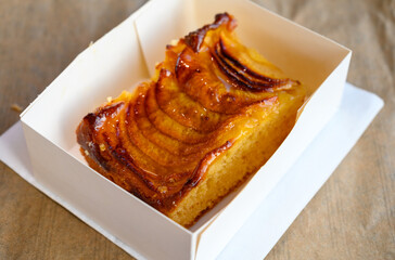 French fresh baked sweet pastry with fresh fruits and berries in confectionery shop close up