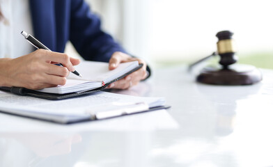 Fototapeta premium Lawyer working with lawsuit in courtroom, Criminal and judgement concept..